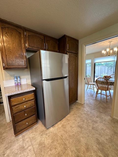 291 Klamath Road Milpitas, CA 95035 - Photo 6 of 20 a kitchen with refrigerator and cabinets