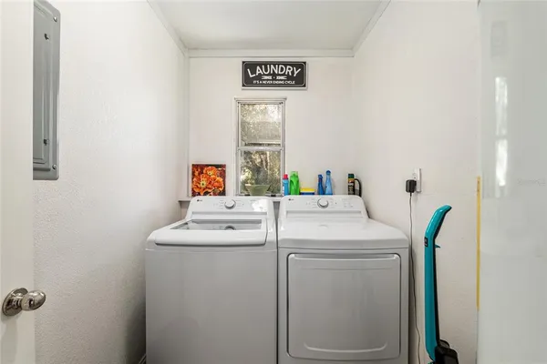 a utility room with dryer and washer