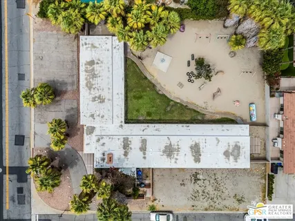 view of a vase of flowers sitting on a table