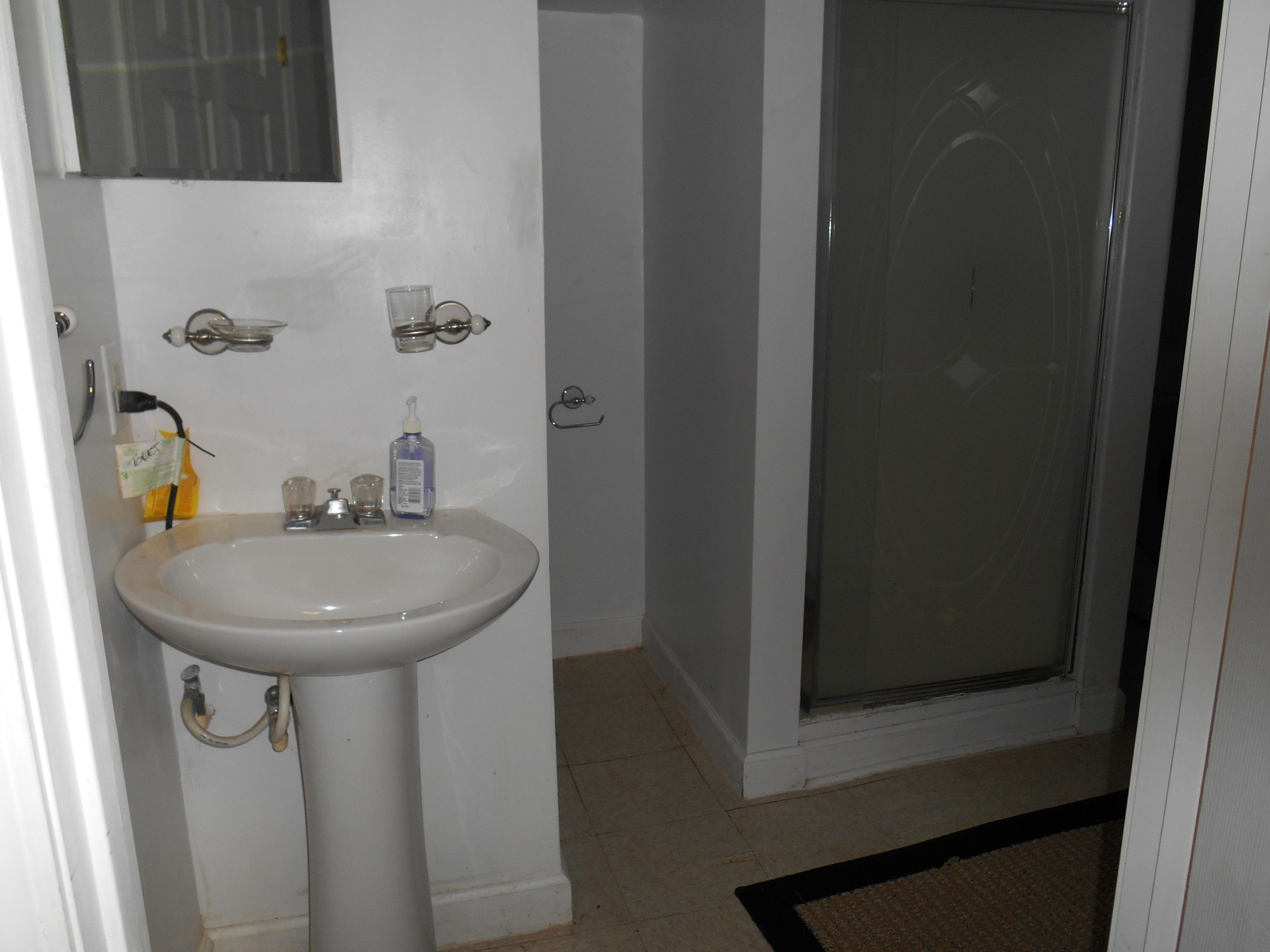384 Lakeside Road Penhook, VA 24137 - Photo 15 of 24 a sink with a mirror