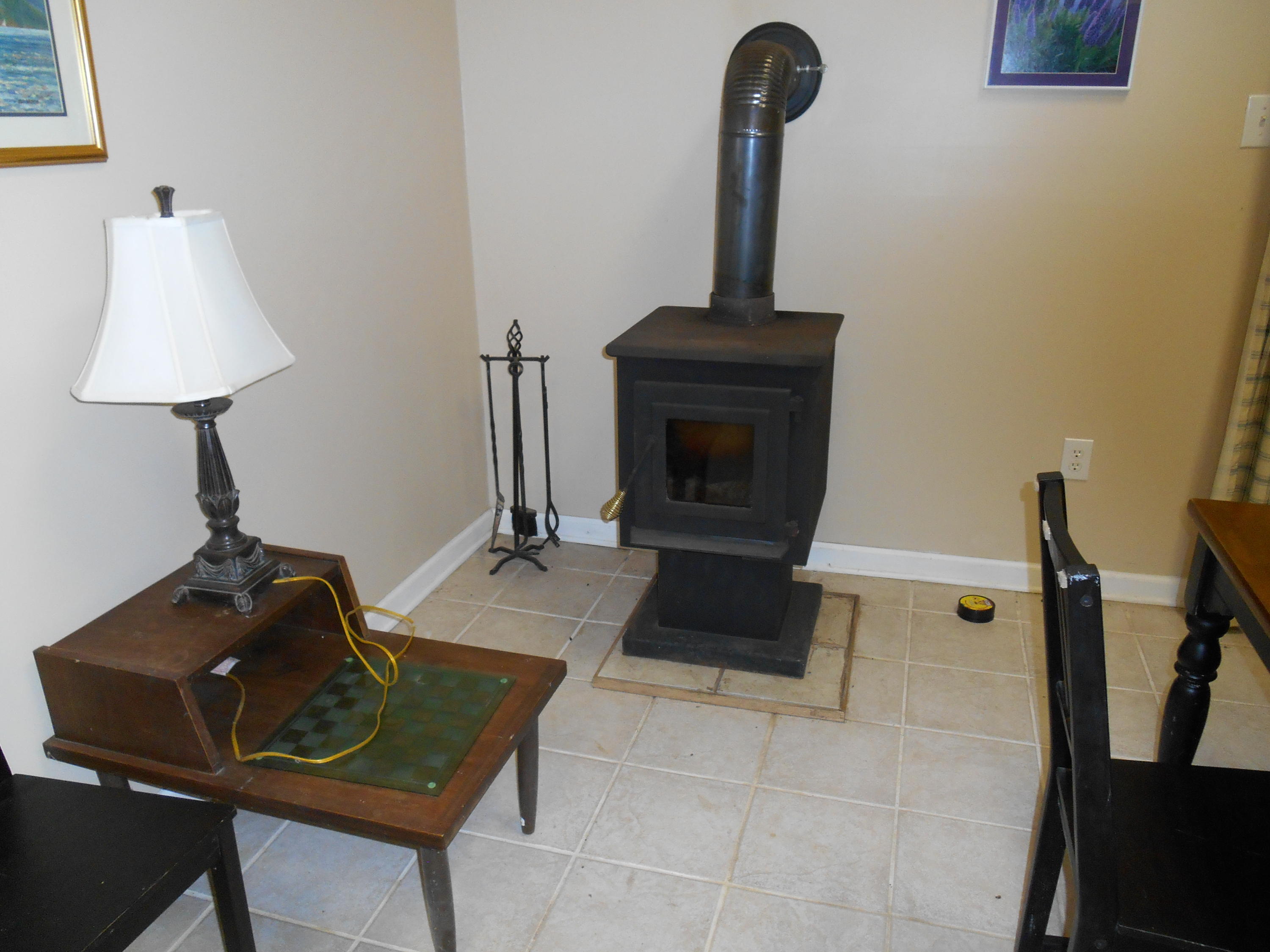 384 Lakeside Road Penhook, VA 24137 - Photo 19 of 24 a living room with furniture and a fireplace