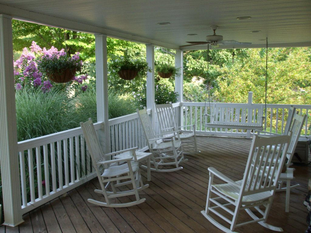 384 Lakeside Road Penhook, VA 24137 - Photo 8 of 24 a view of a chairs and table in the balcony