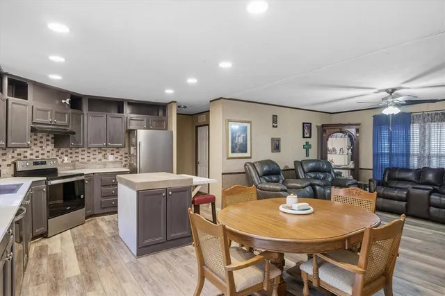 a view of a dining room with furniture
