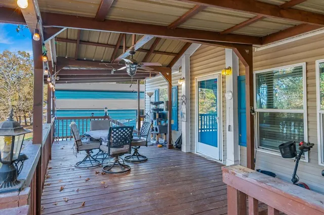 a view of livingroom with seating space and wooden floor