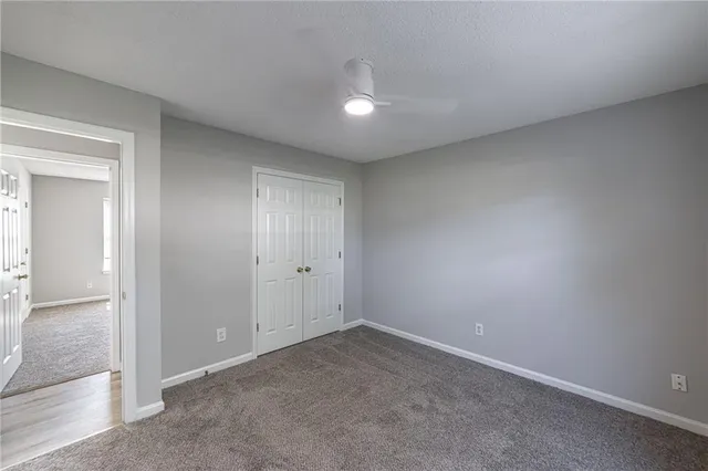 a view of swimming pool with a patio