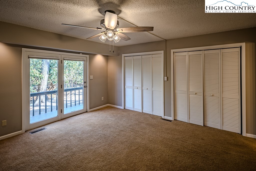 290 Cobble Creek Lane Boone, NC 28607 - Photo 19 of 33 a view of an empty room with a window