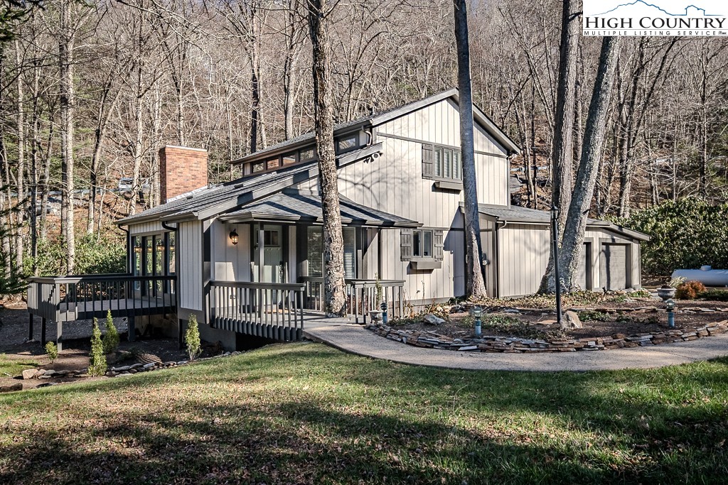 290 Cobble Creek Lane Boone, NC 28607 - Photo 2 of 33 a front view of a house with a yard