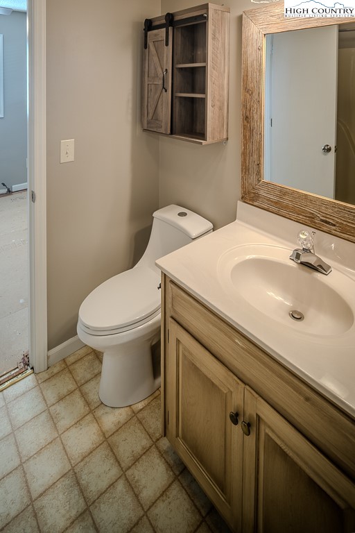 290 Cobble Creek Lane Boone, NC 28607 - Photo 27 of 33 a bathroom with a sink toilet and mirror