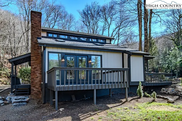 a view of a backyard of the house