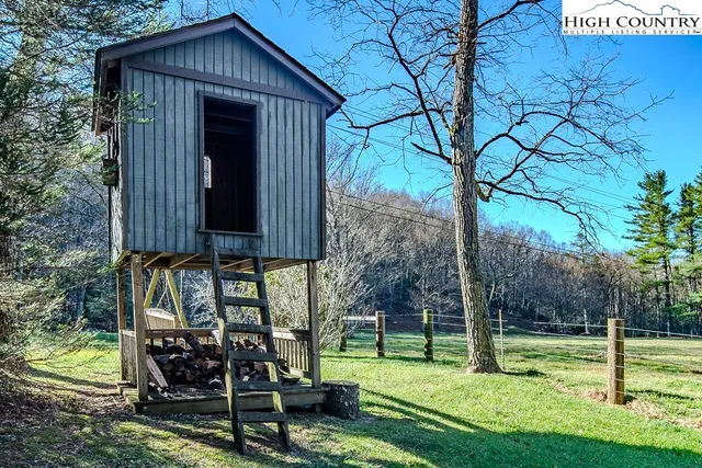 a view of a two chairs in the deck