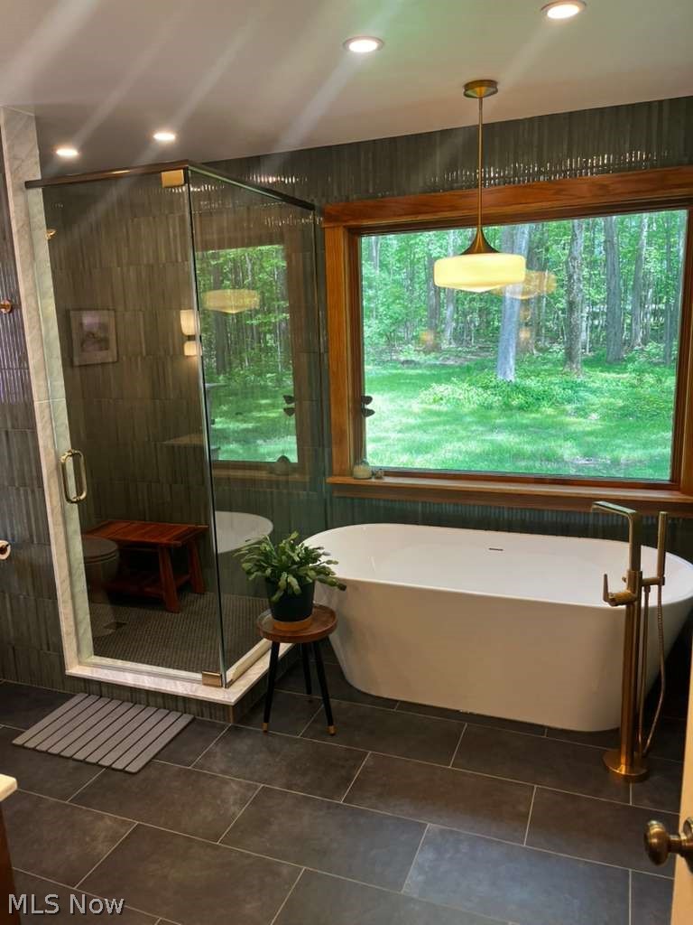 31599 Fairview Road Chagrin Falls, OH 44022 - Photo 28 of 50 The stand-alone soaking bathub of the Primary Bathroom awaits your pleasure