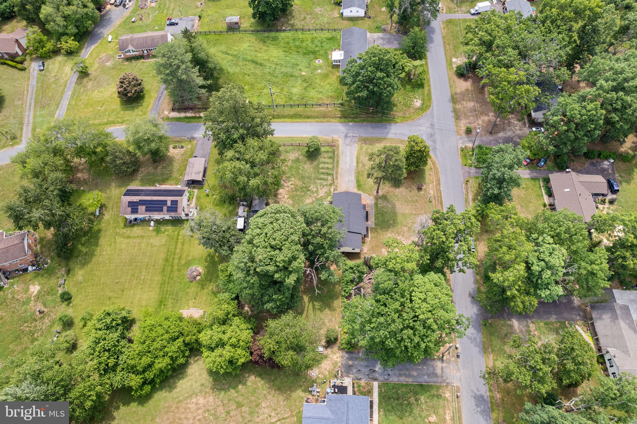 12237 Randle Lane Culpeper, VA 22701 - Photo 30 of 31 an aerial view of a house with swimming pool and garden