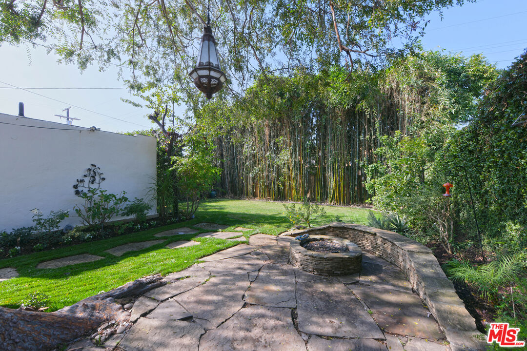 1657 South Point View Street Los Angeles, CA 90035 - Photo 43 of 50 a view of a backyard with a garden