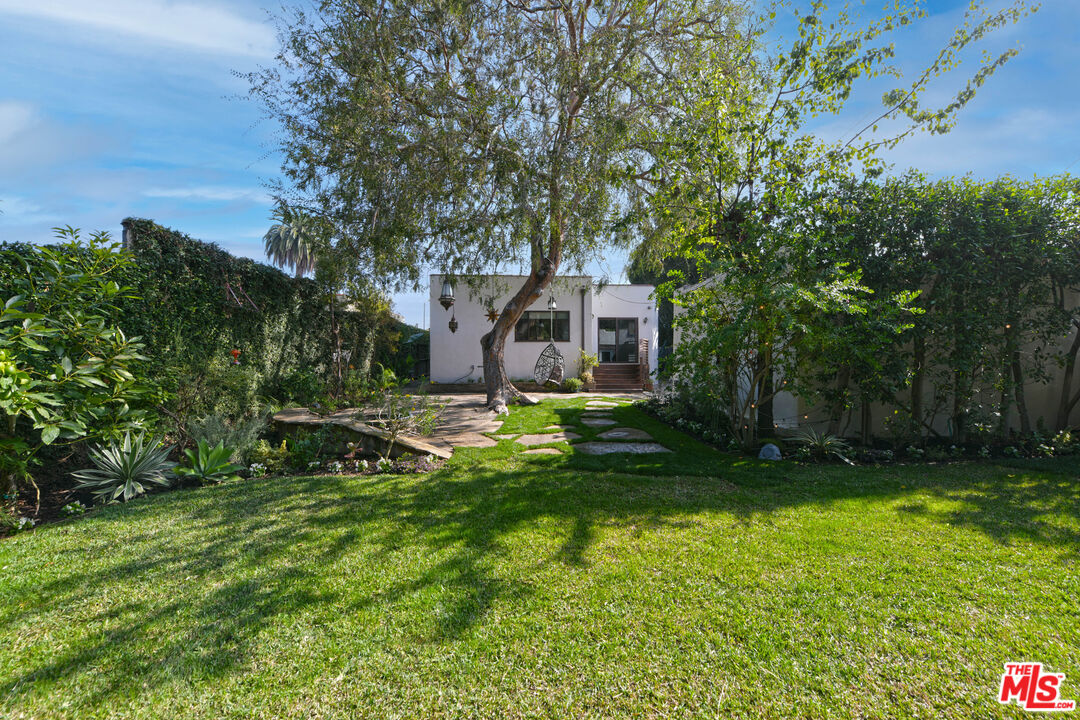 1657 South Point View Street Los Angeles, CA 90035 - Photo 47 of 50 a view of a house with a yard