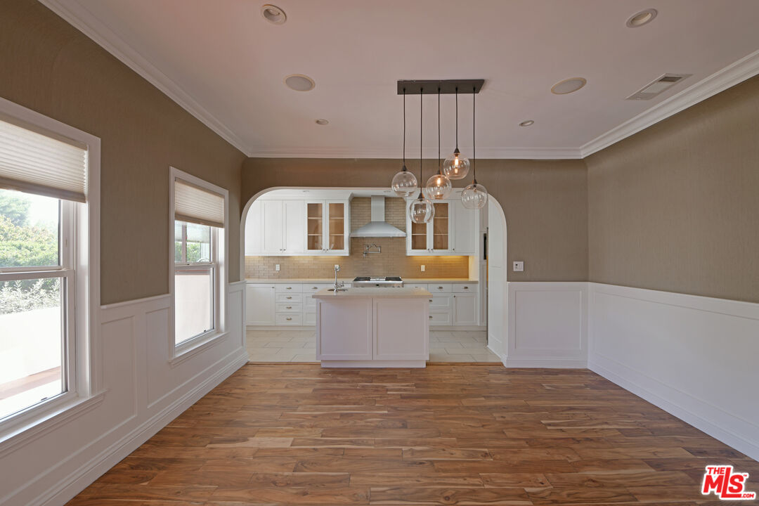 1657 South Point View Street Los Angeles, CA 90035 - Photo 6 of 50 a very nice looking room with a large window