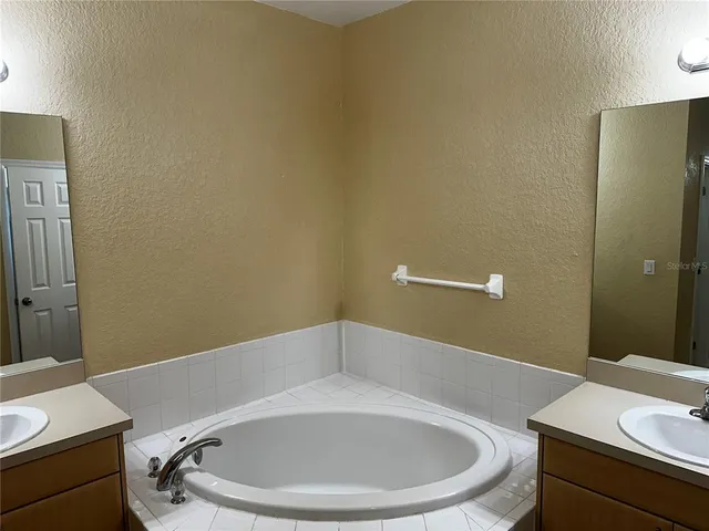 a bathroom with a sink and a vanity