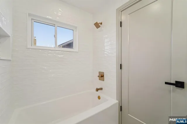 a bathroom with a bathtub