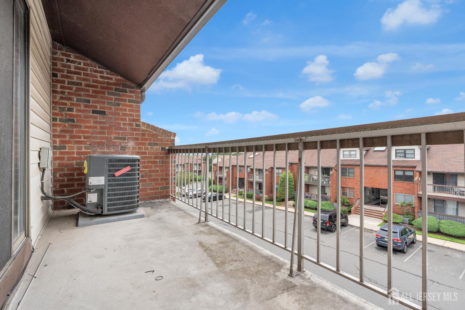101 Beverly Hl Terrace, Unit M Woodbridge, NJ 07095 - Photo 23 of 28 a view of a balcony with chairs