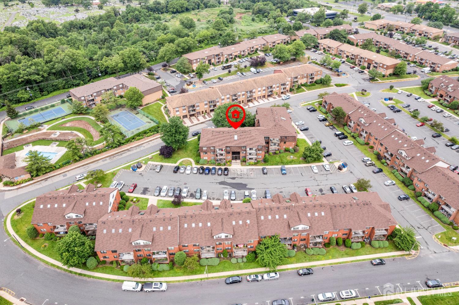 101 Beverly Hl Terrace, Unit M Woodbridge, NJ 07095 - Photo 26 of 28 an aerial view of a house with a yard