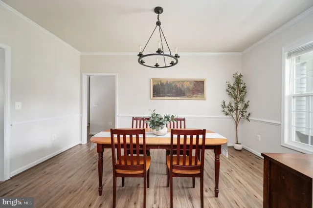 a view of a livingroom with wooden floor