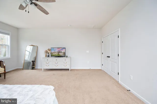 a view of a two chairs in the balcony