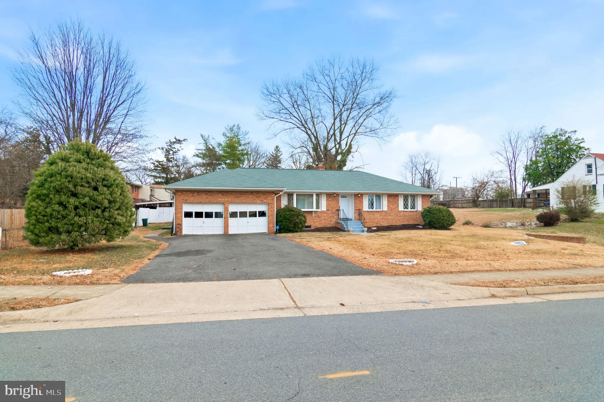 3723 Munson Road Falls Church, VA 22041 - Photo 16 of 30 a front view of a house with a yard