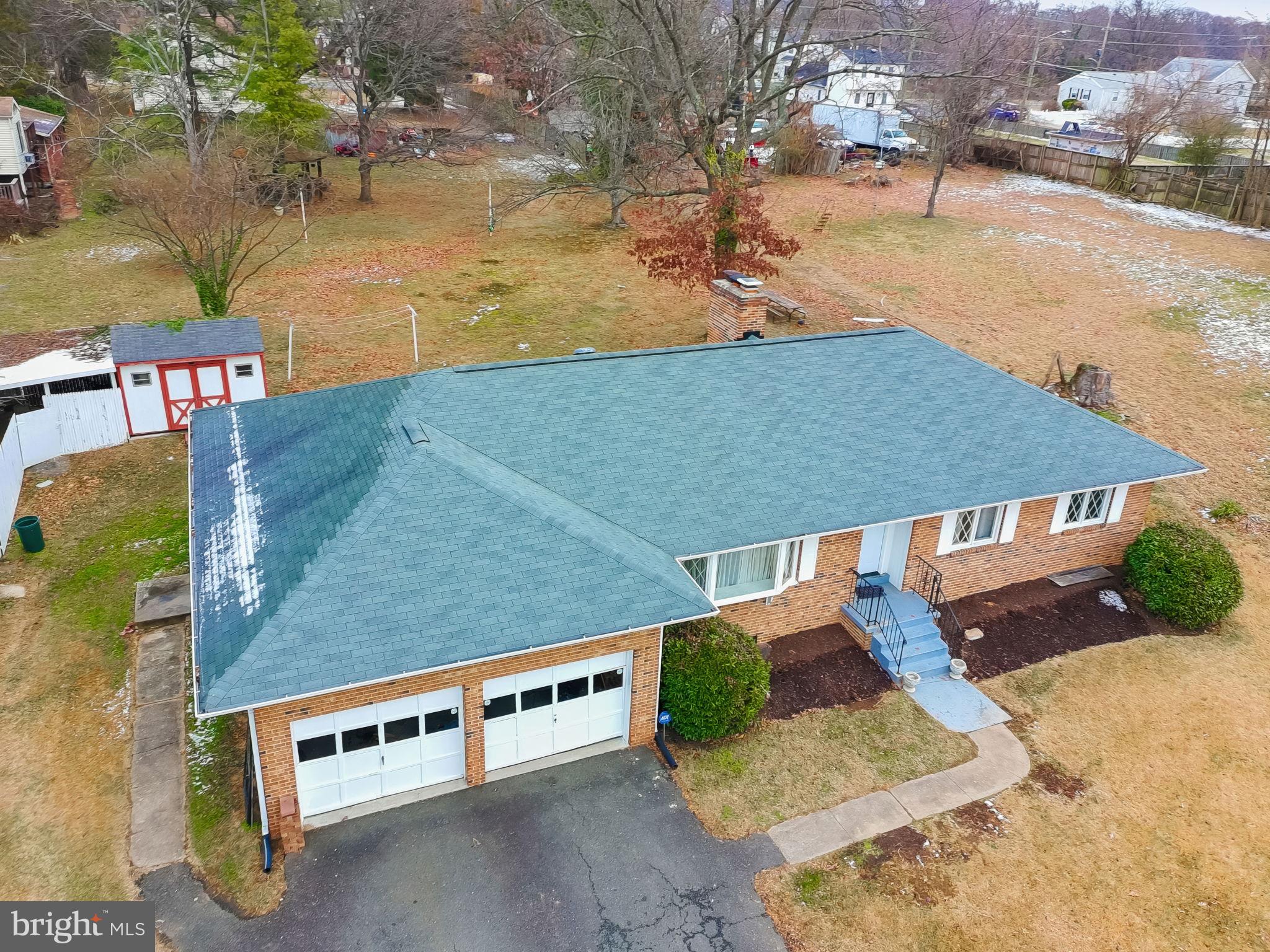 3723 Munson Road Falls Church, VA 22041 - Photo 22 of 30 an aerial view of a house with swimming pool