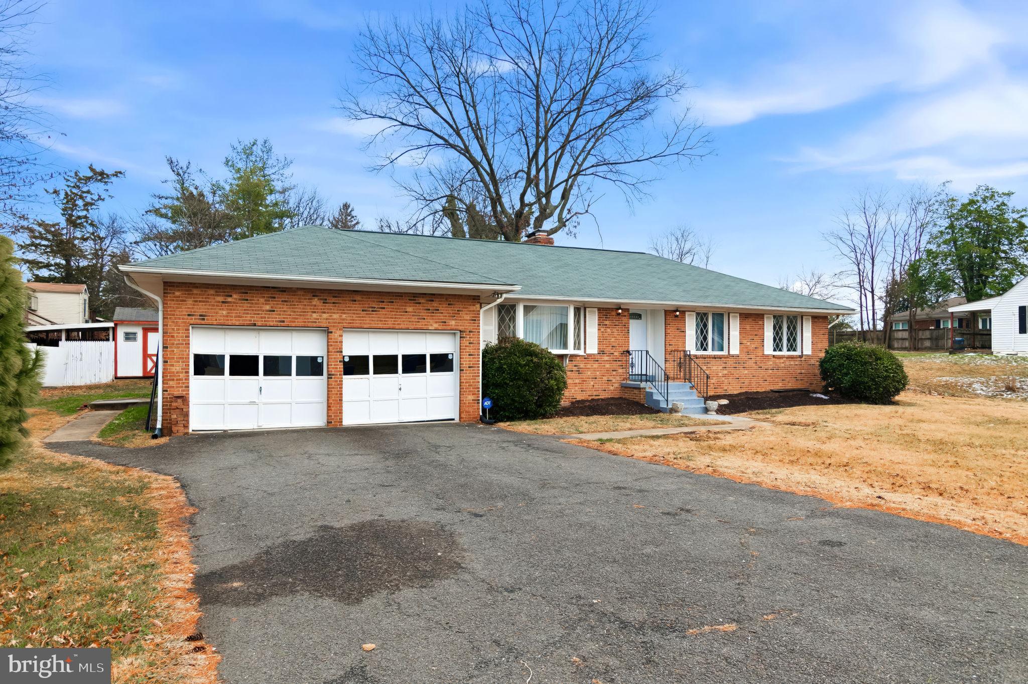 3723 Munson Road Falls Church, VA 22041 - Photo 3 of 30 a front view of a house with a garden