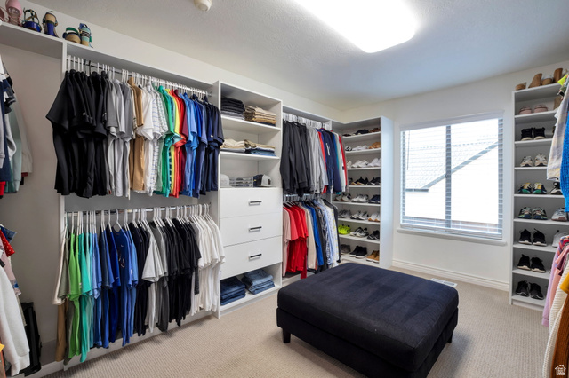 577 South Ridge Top Lane East North Salt Lake, UT 84054 - Photo 16 of 57 Custom walk-in closet with extensive built-ins designed to maximize organization and storage.