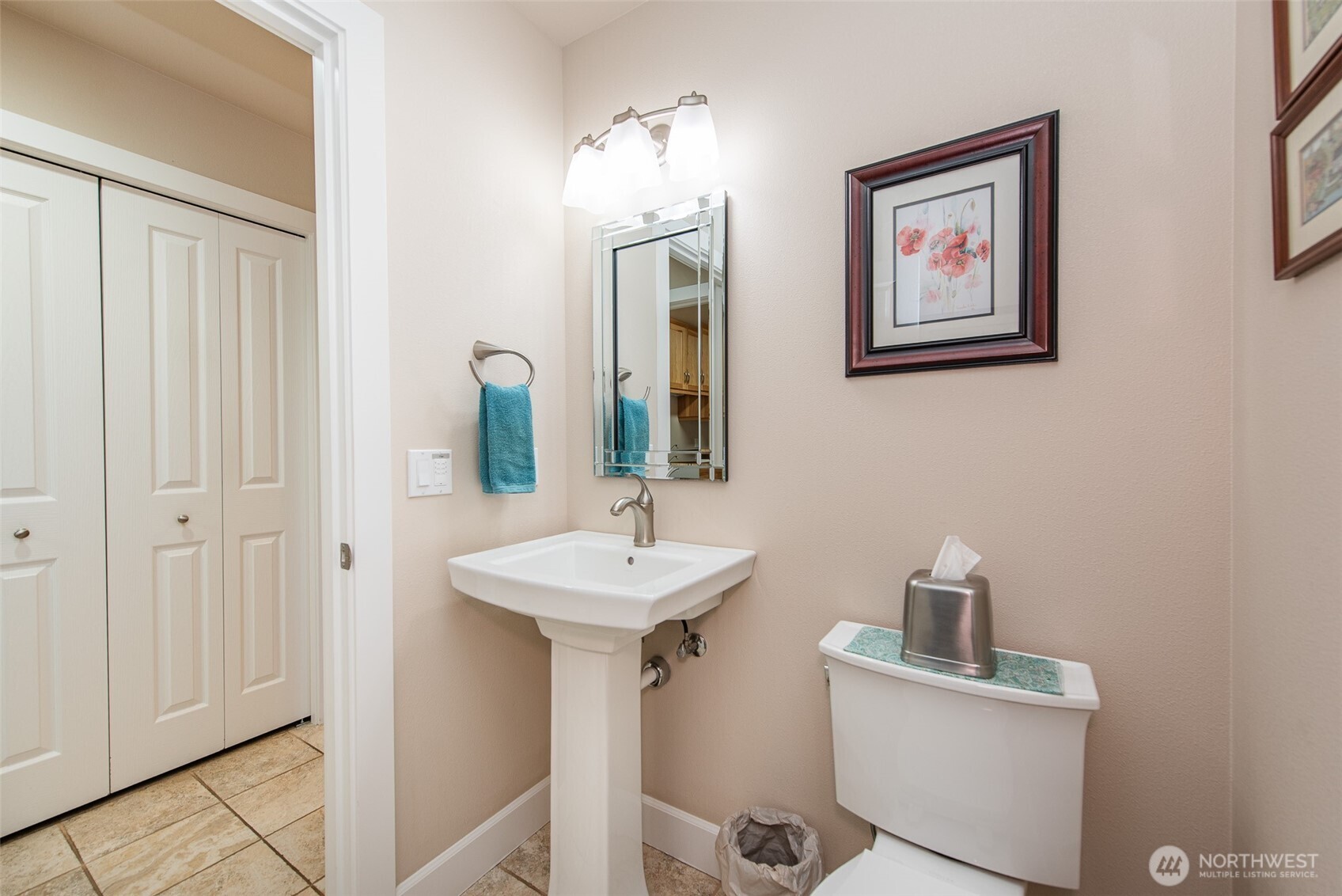 141 Pheasant Run Drive Sequim, WA 98382 - Photo 18 of 40 a bathroom with a sink and a mirror