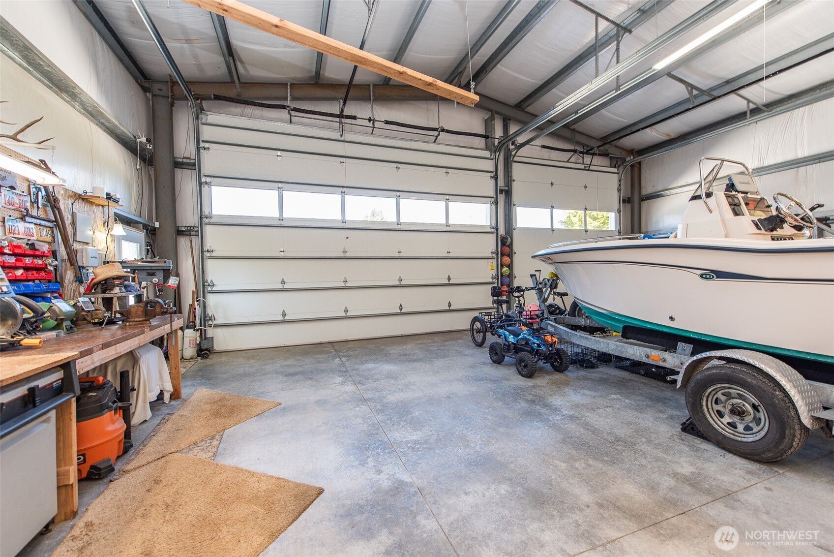 141 Pheasant Run Drive Sequim, WA 98382 - Photo 29 of 40 a storage room with lots of wooden furniture
