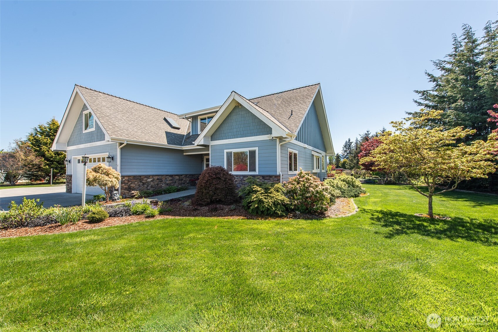141 Pheasant Run Drive Sequim, WA 98382 - Photo 32 of 40 a front view of house with yard and green space