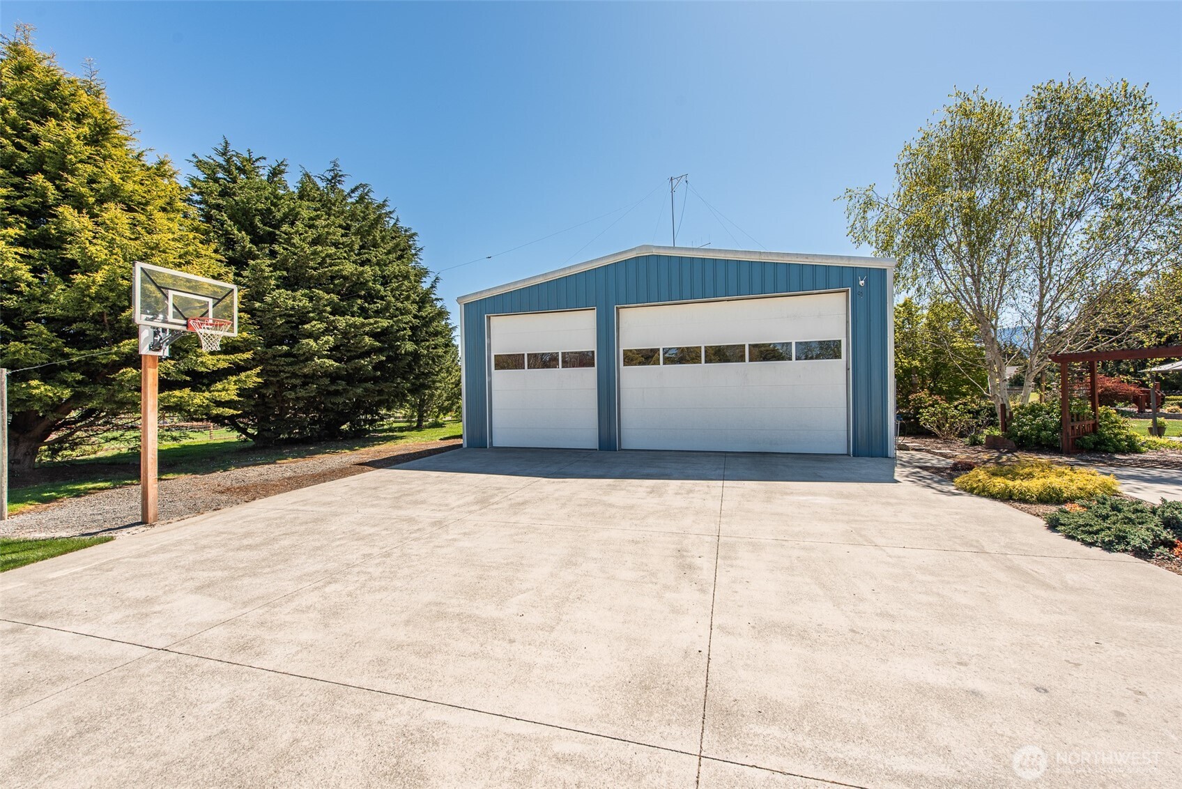 141 Pheasant Run Drive Sequim, WA 98382 - Photo 38 of 40 a front view of a building with trees