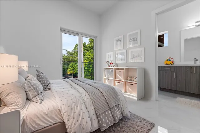 a bedroom with a bed and a cabinets