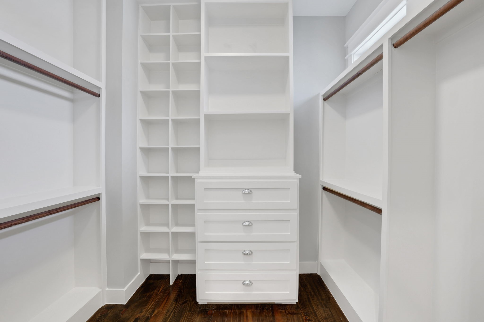 914 Robbie Street Houston, TX 77009 - Photo 36 of 50 a view of walk in closet with empty racks