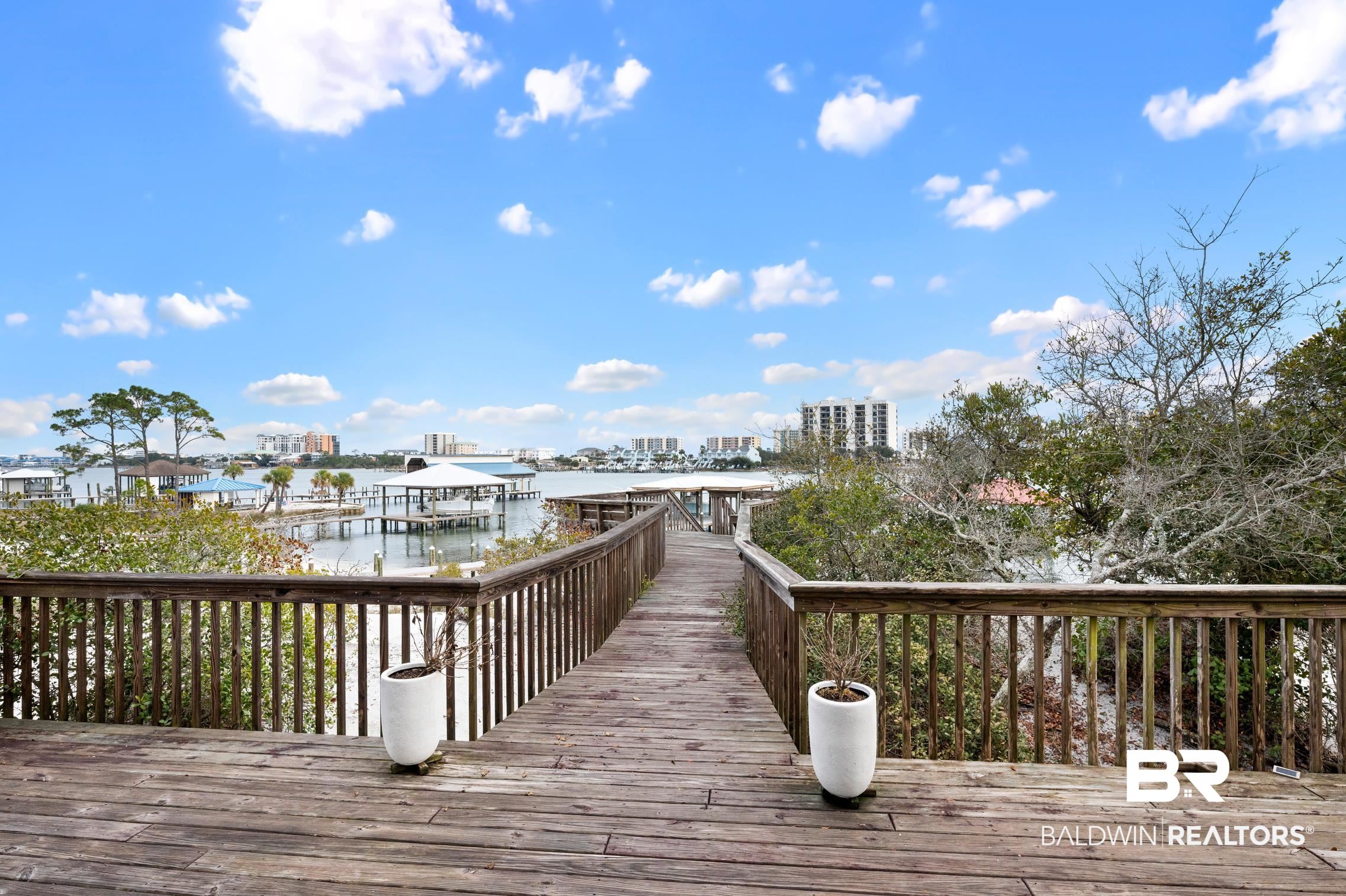 30388 River Road Orange Beach, AL 36561 - Photo 8 of 72 Deck featuring a water view