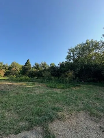 a view of outdoor space and yard
