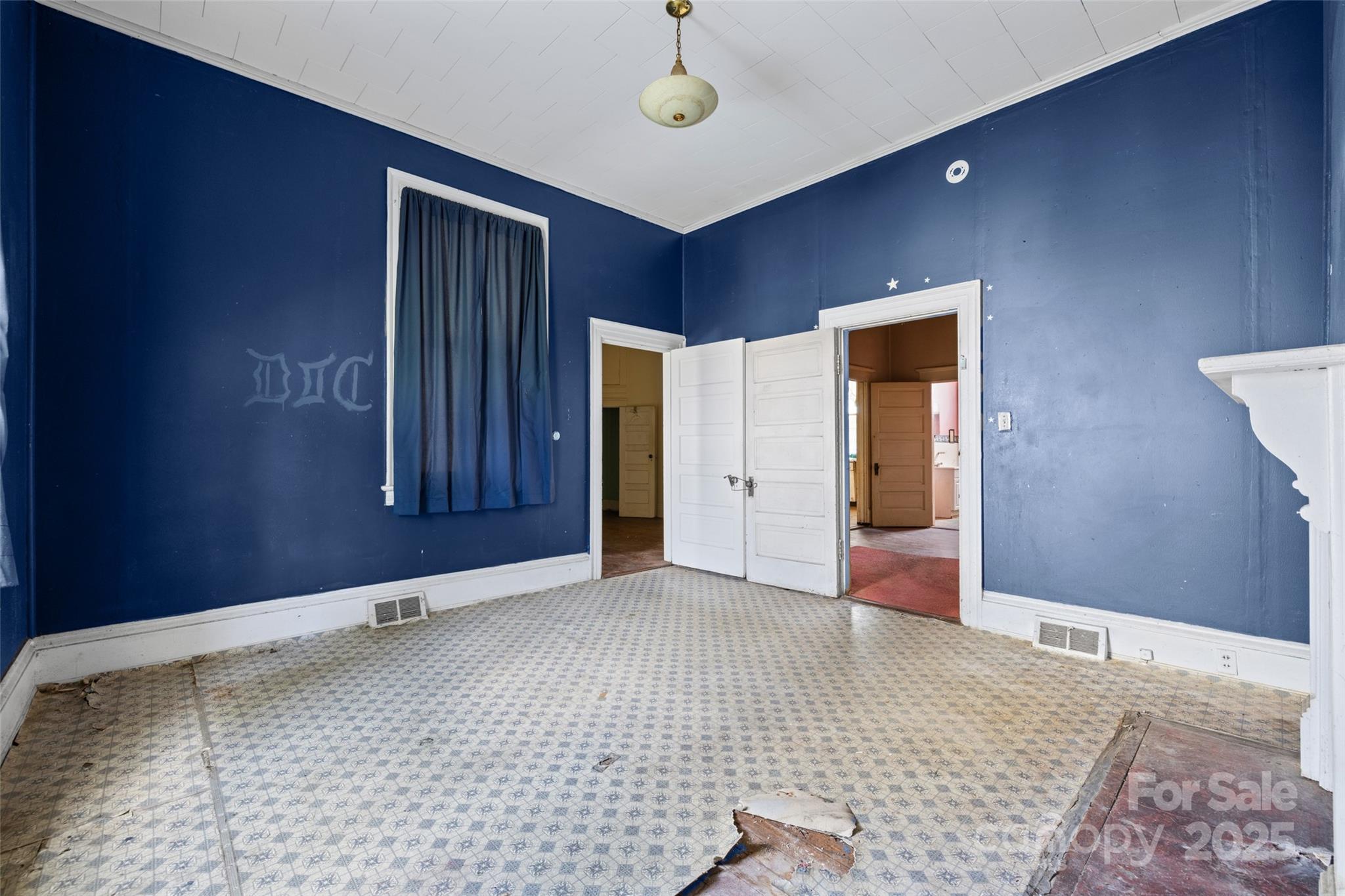 108 Walker Street Chester, SC 29706 - Photo 12 of 31 a view of an empty room with window and cabinet