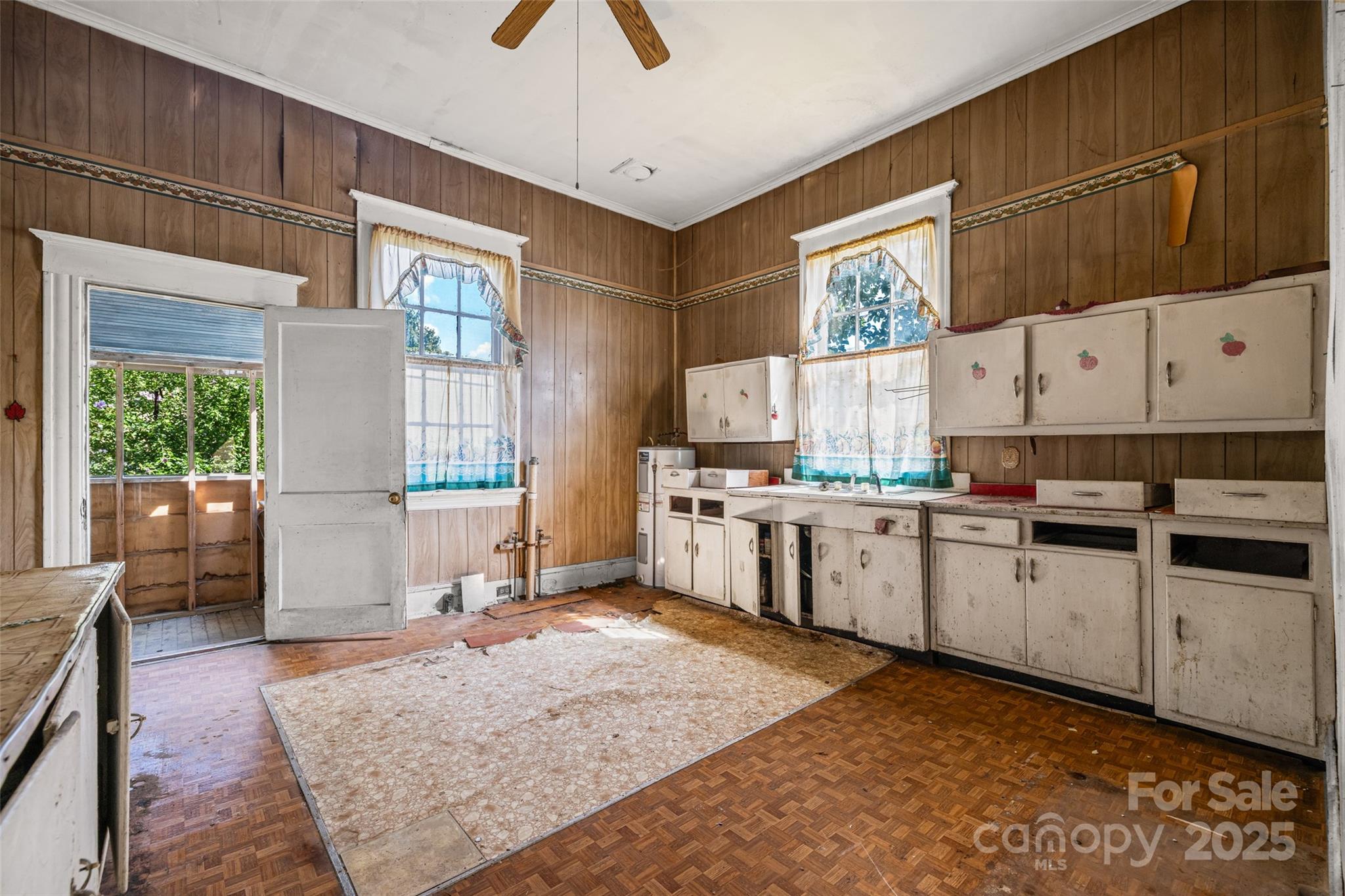 108 Walker Street Chester, SC 29706 - Photo 16 of 31 a kitchen with sink cabinets and window