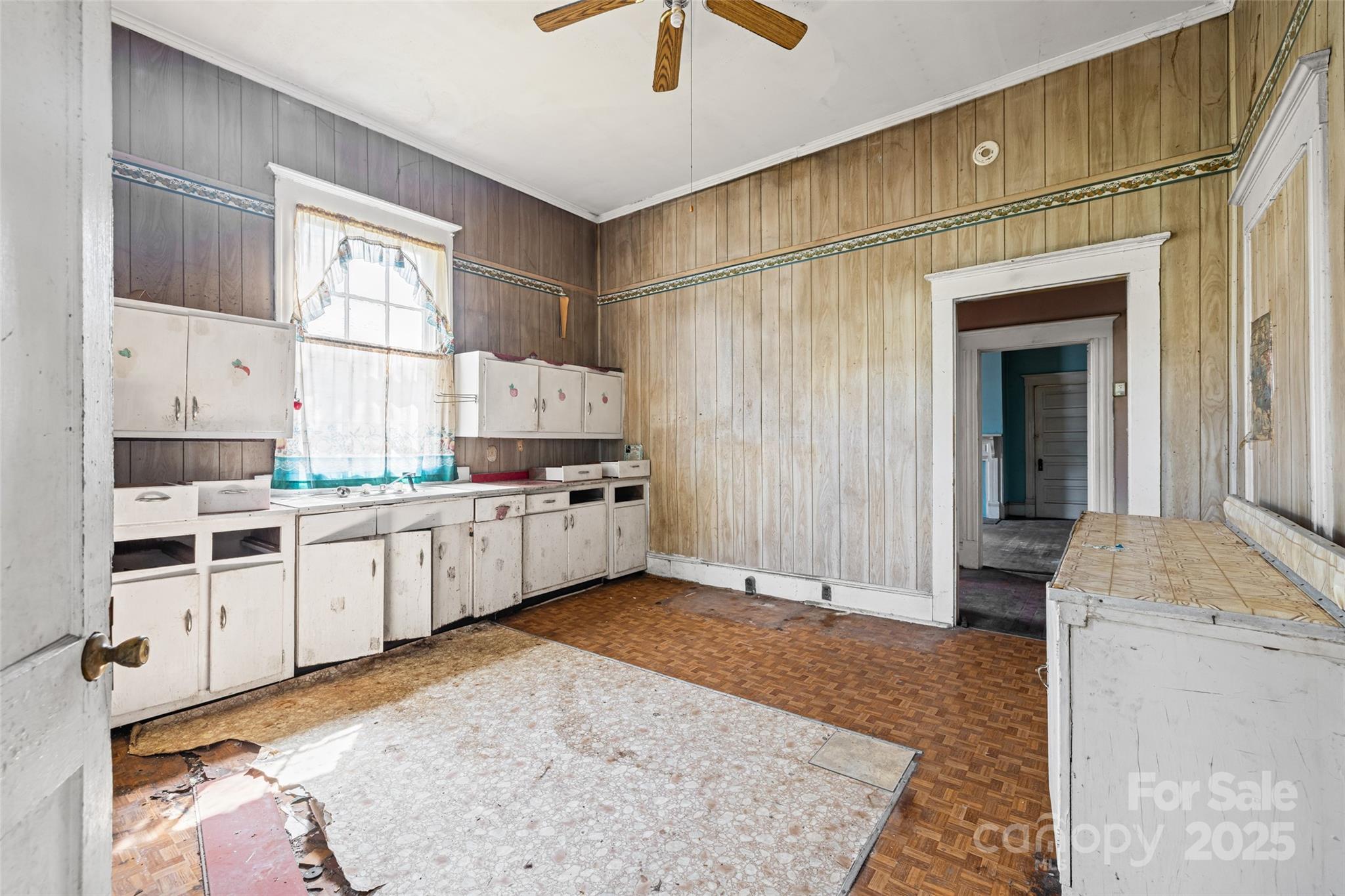 108 Walker Street Chester, SC 29706 - Photo 17 of 31 a kitchen with granite countertop a sink cabinets and window