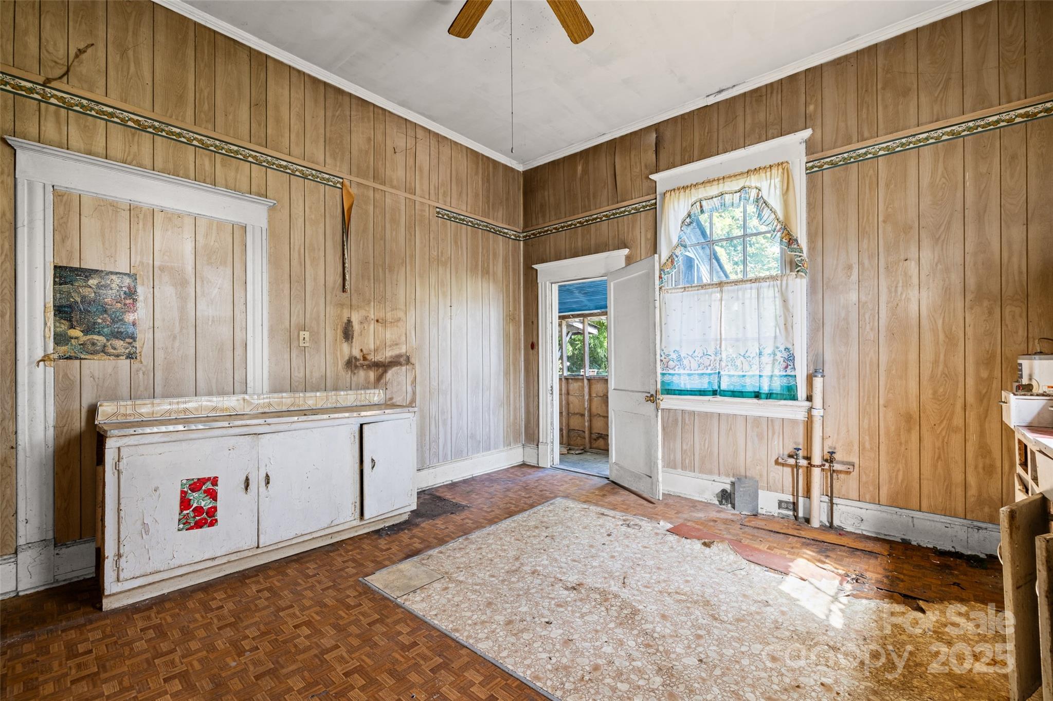 108 Walker Street Chester, SC 29706 - Photo 19 of 31 a utility room with cabinets a sink and a window