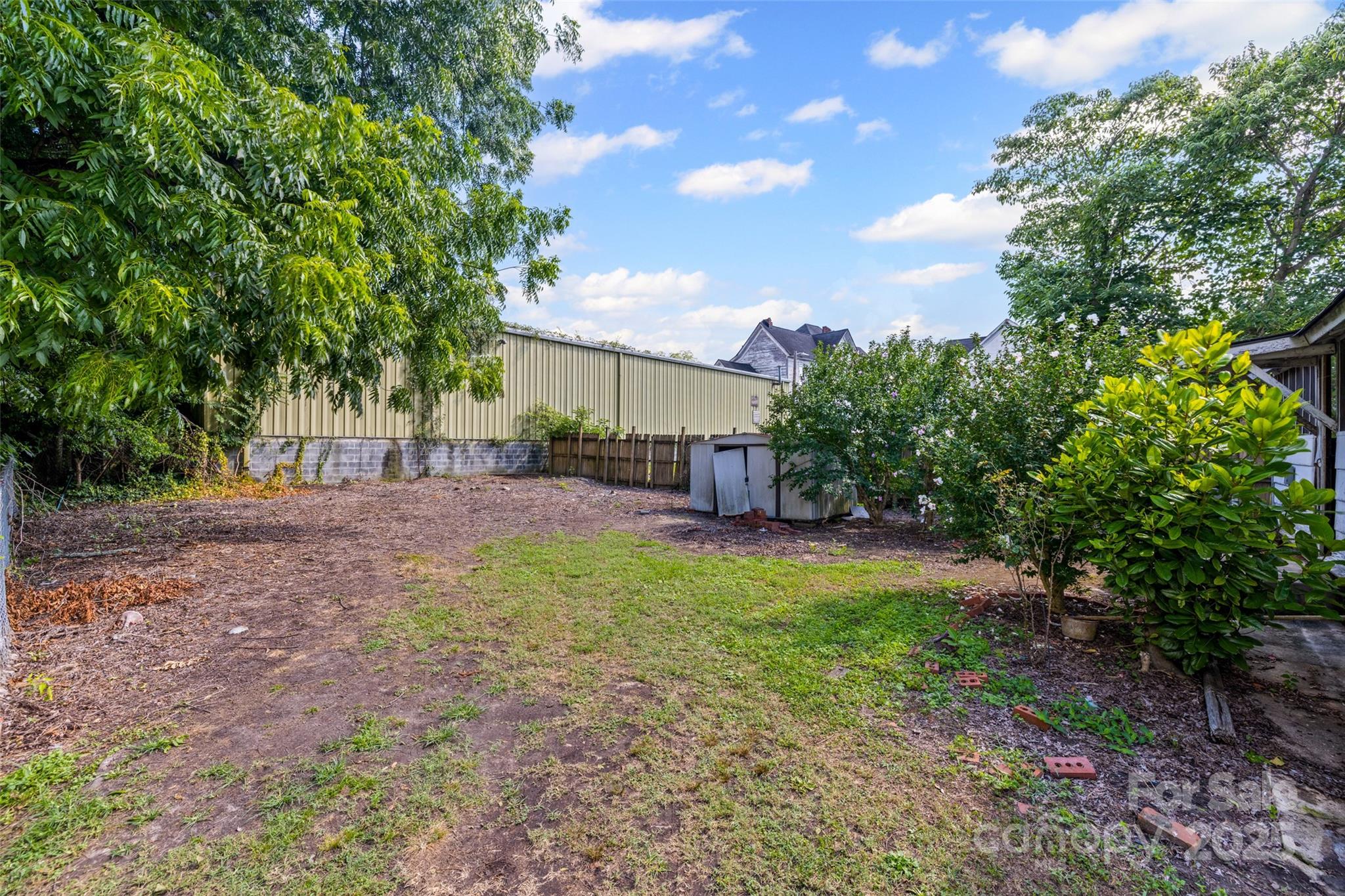 108 Walker Street Chester, SC 29706 - Photo 28 of 31 a view of a yard with plants and trees