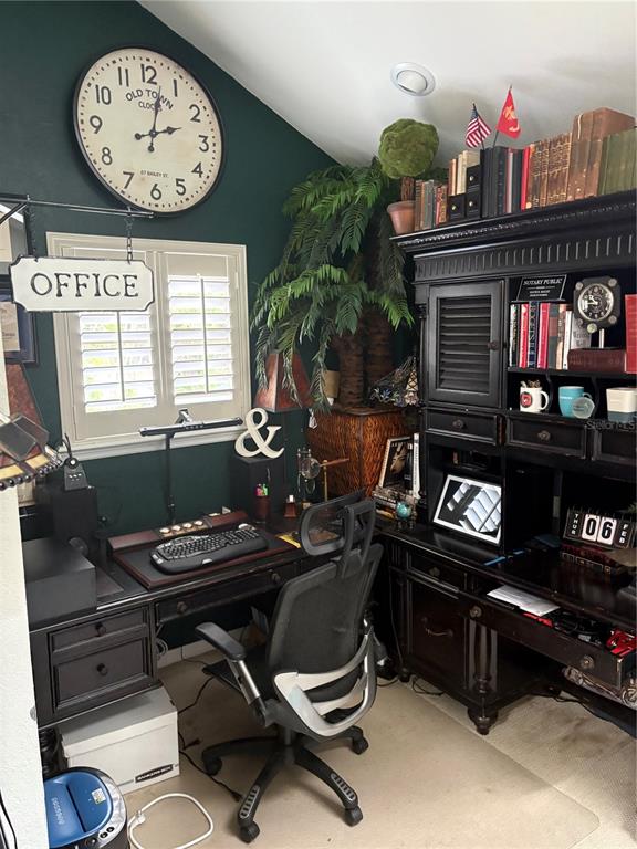 280 Springside Road Longwood, FL 32779 - Photo 17 of 29 a living room with furniture a piano and a bookshelf