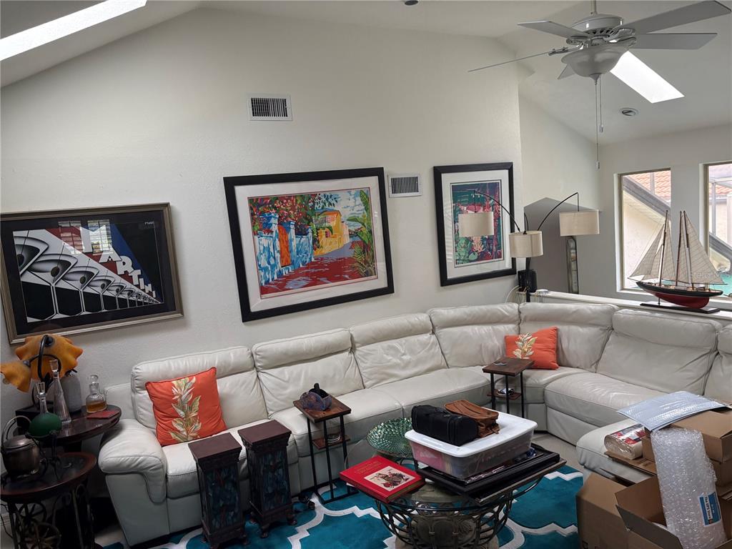 280 Springside Road Longwood, FL 32779 - Photo 18 of 29 a living room with furniture and a rug