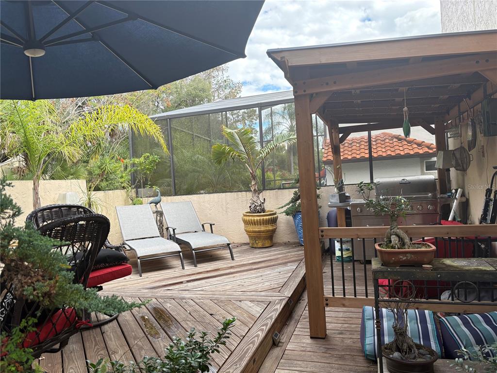 280 Springside Road Longwood, FL 32779 - Photo 20 of 29 a outdoor space with chairs and wooden floor