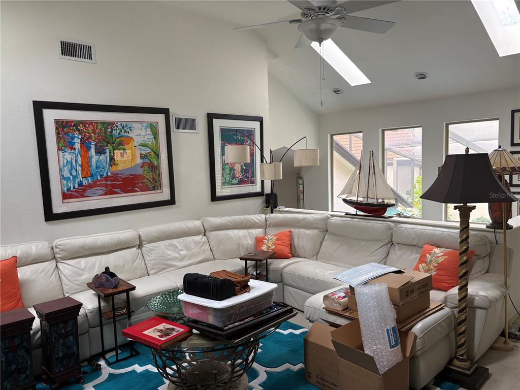 280 Springside Road Longwood, FL 32779 - Photo 22 of 29 a living room with furniture and a ceiling fan