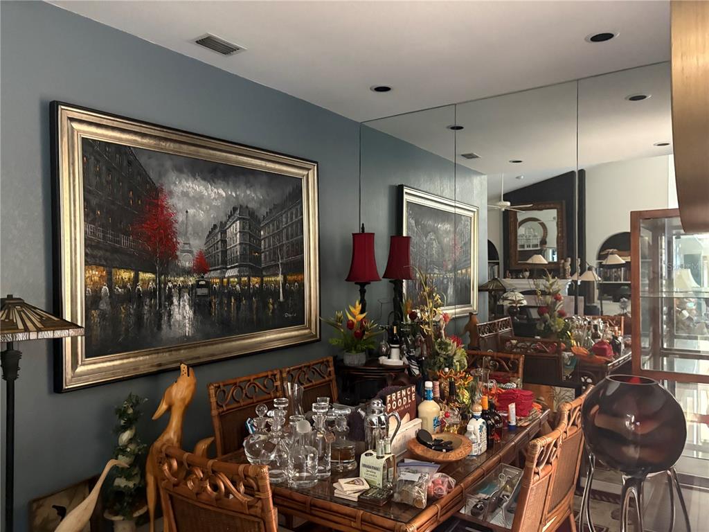 280 Springside Road Longwood, FL 32779 - Photo 26 of 29 a room with lots of frames and chairs