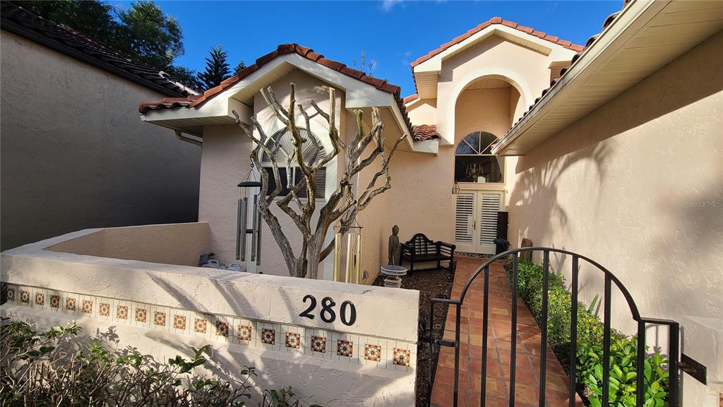 280 Springside Road Longwood, FL 32779 - Photo 4 of 29 a view of a house with a snow