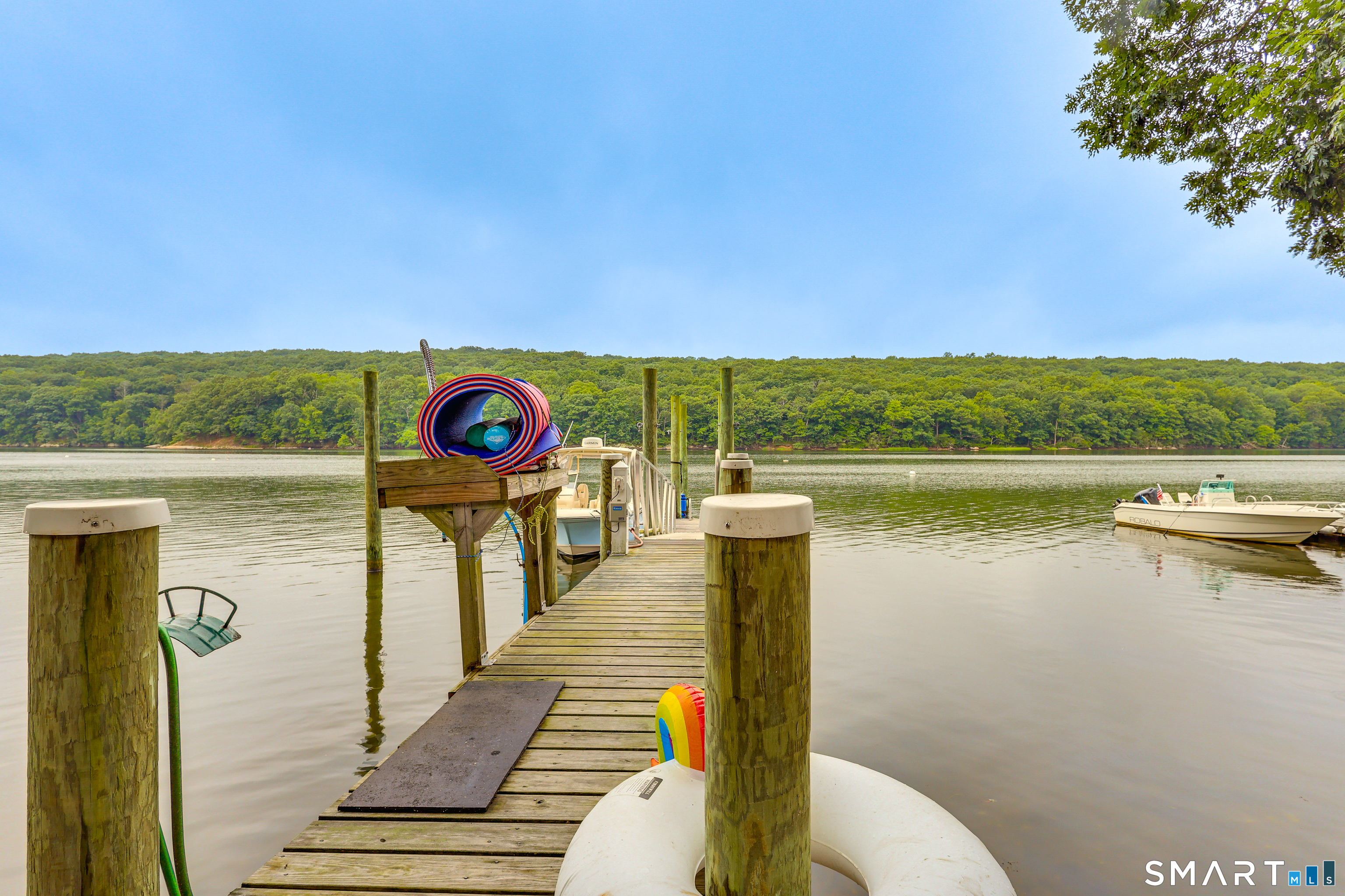 11 Stanton Street Waterford, CT 06385 - Photo 13 of 40 a view of a lake with couches in the patio