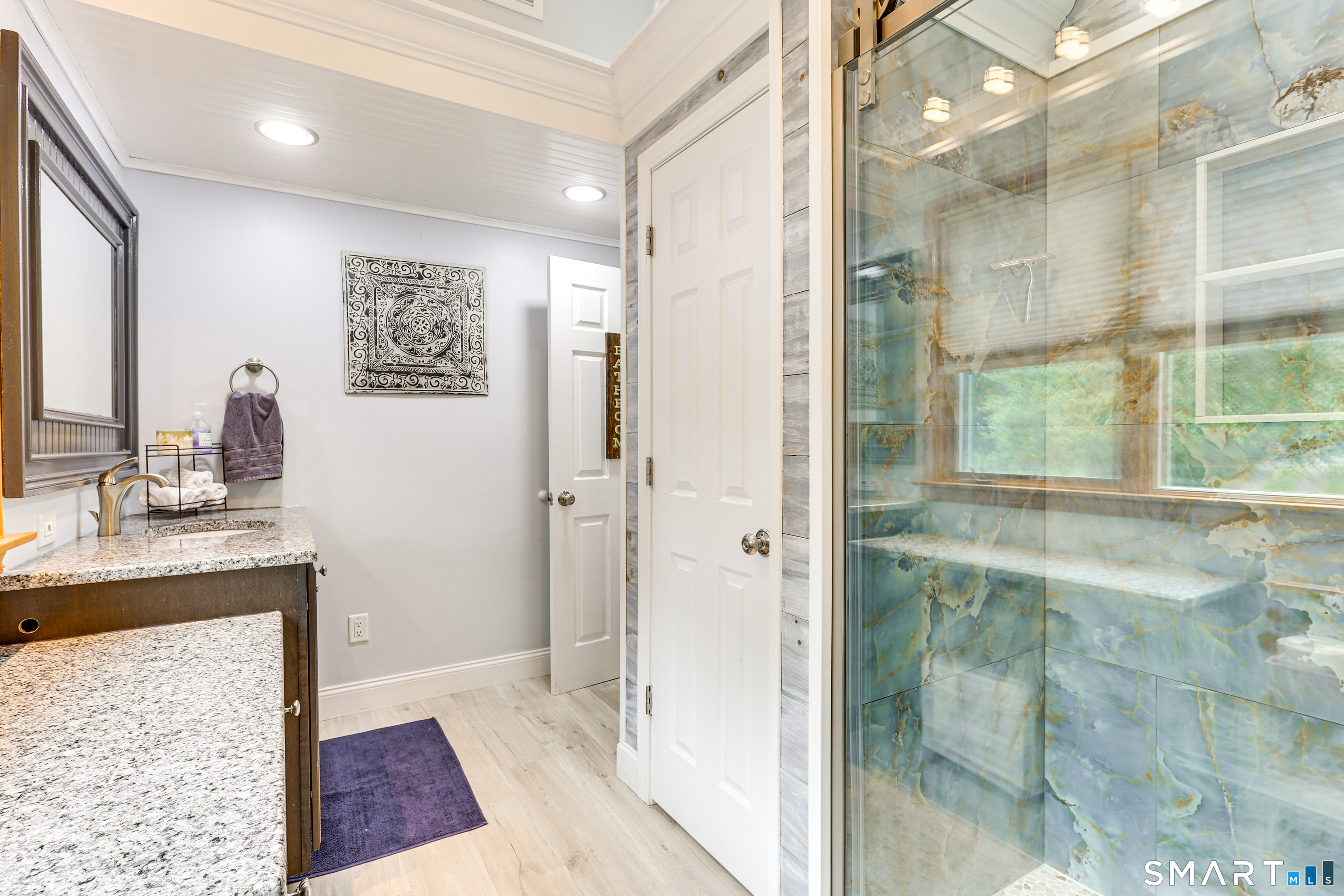 11 Stanton Street Waterford, CT 06385 - Photo 28 of 40 a bathroom with a sink and a shower